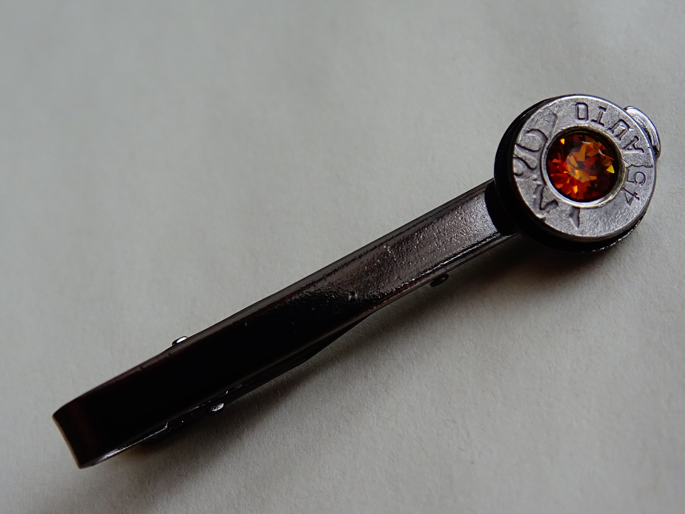 Bullet tie clip gun metal topaz .45 ACP __etsy:2241560615