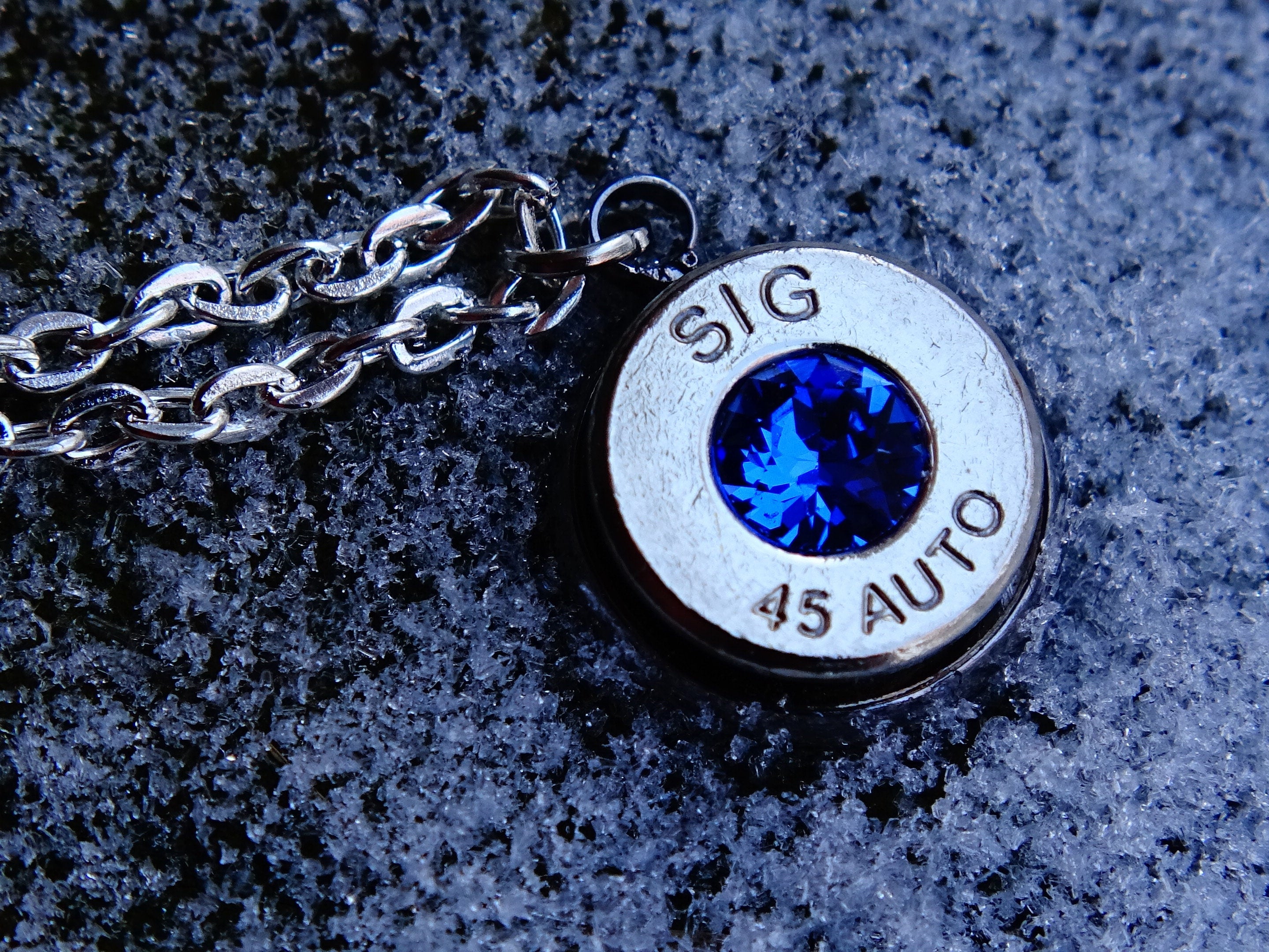 bullet 45 ACP pendant swarovski blue sapphire