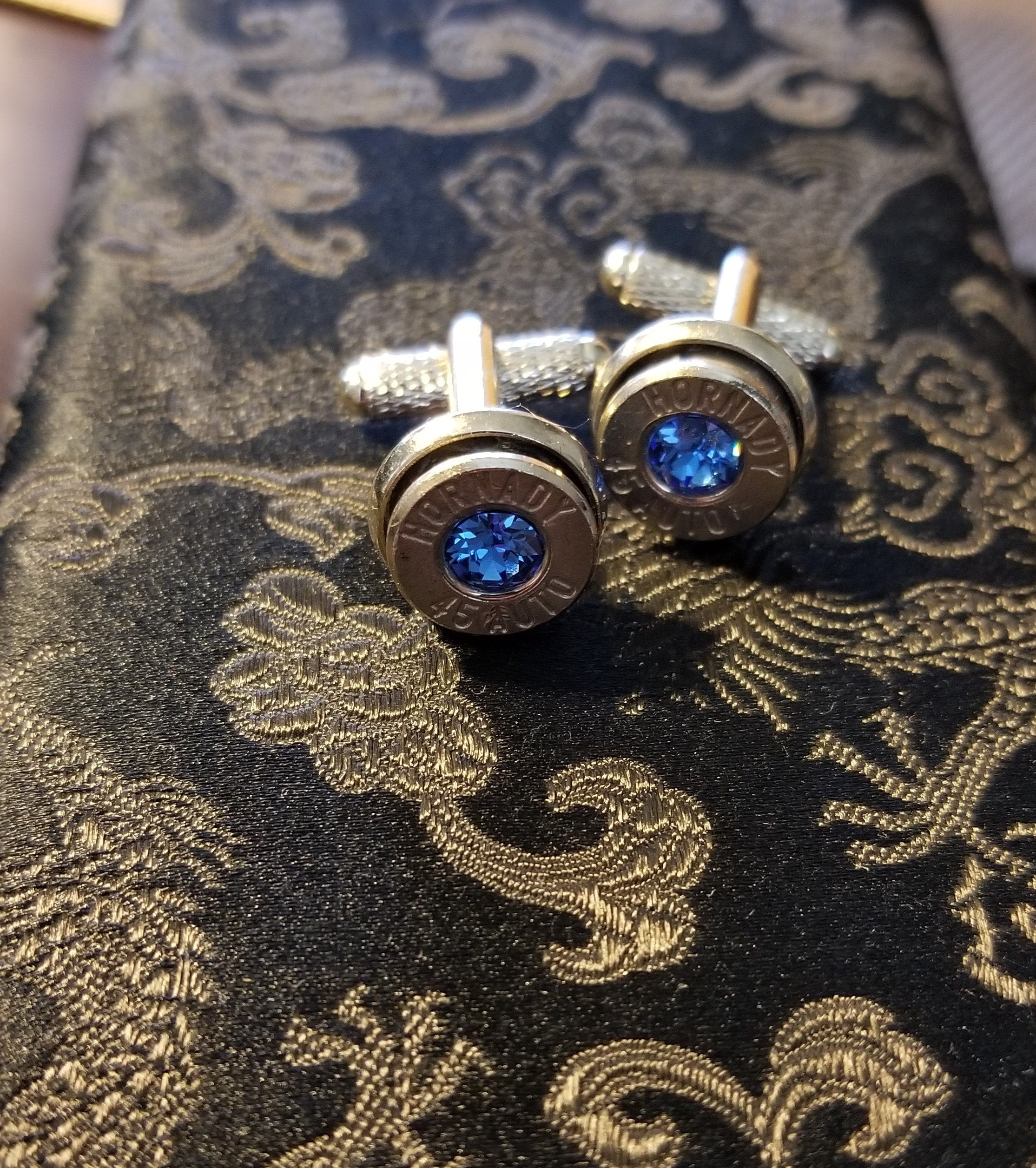 Cufflinks made with .45 Caliber bullet shells (etsy image id: 1916385408)