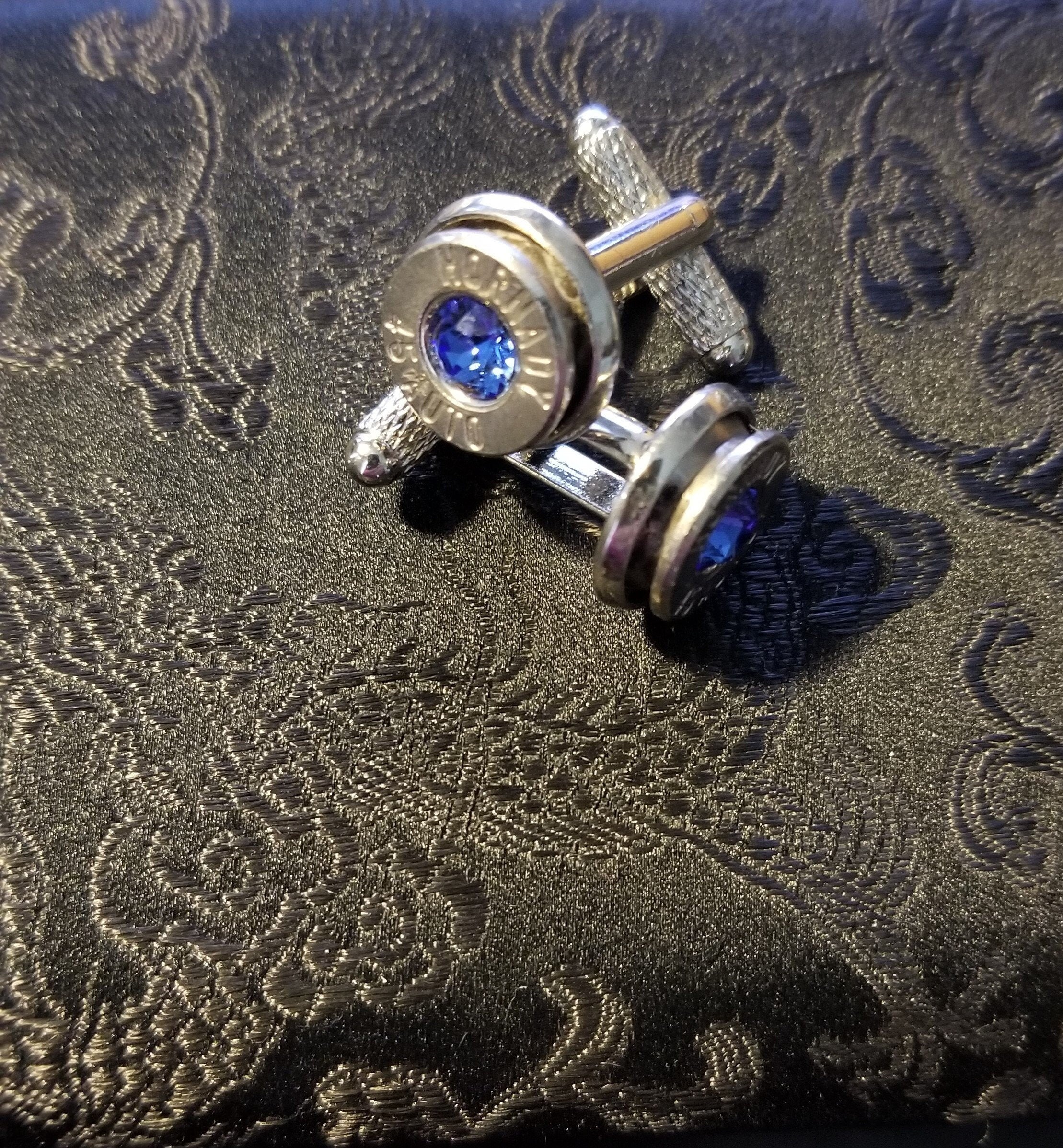 Cufflinks made with .45 Caliber bullet shells (etsy image id: 1916389320)