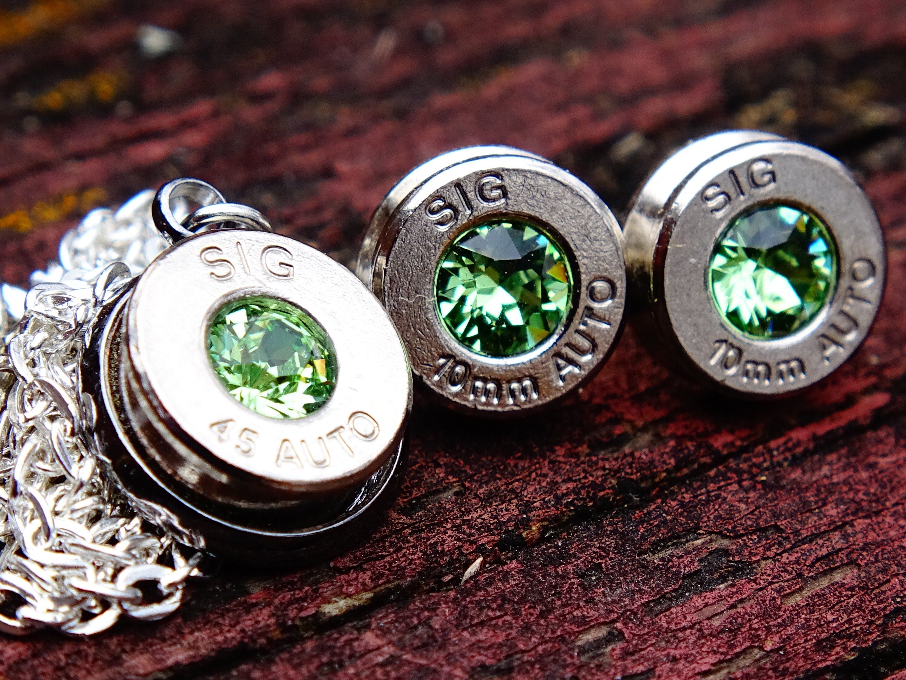 10mm bullet earrings & 45 ACP pendant set swarovski peridot (etsy image id: 2122574202)