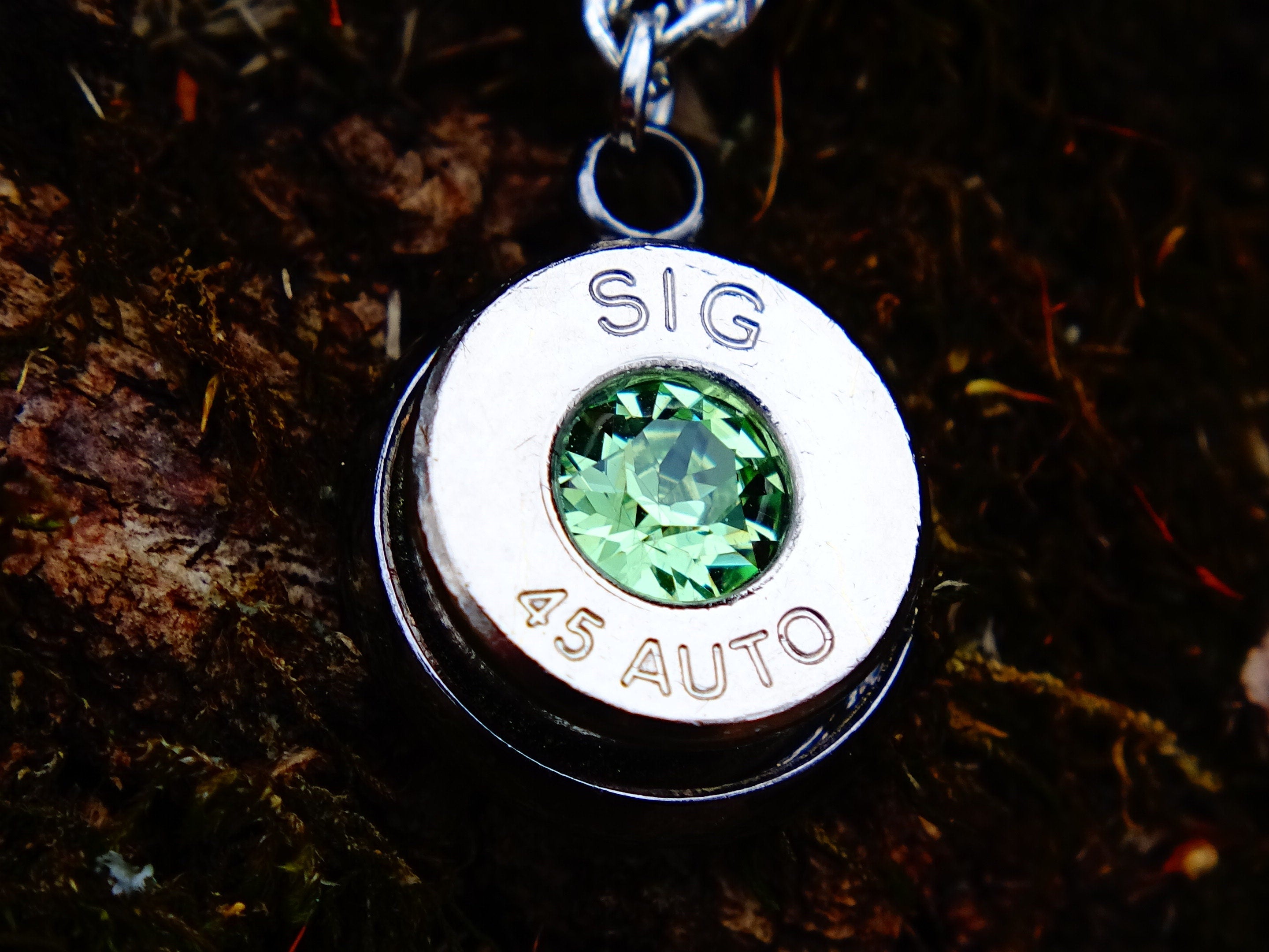 bullet 45 ACP pendant swarovski peridot (etsy image id: 2122574642)