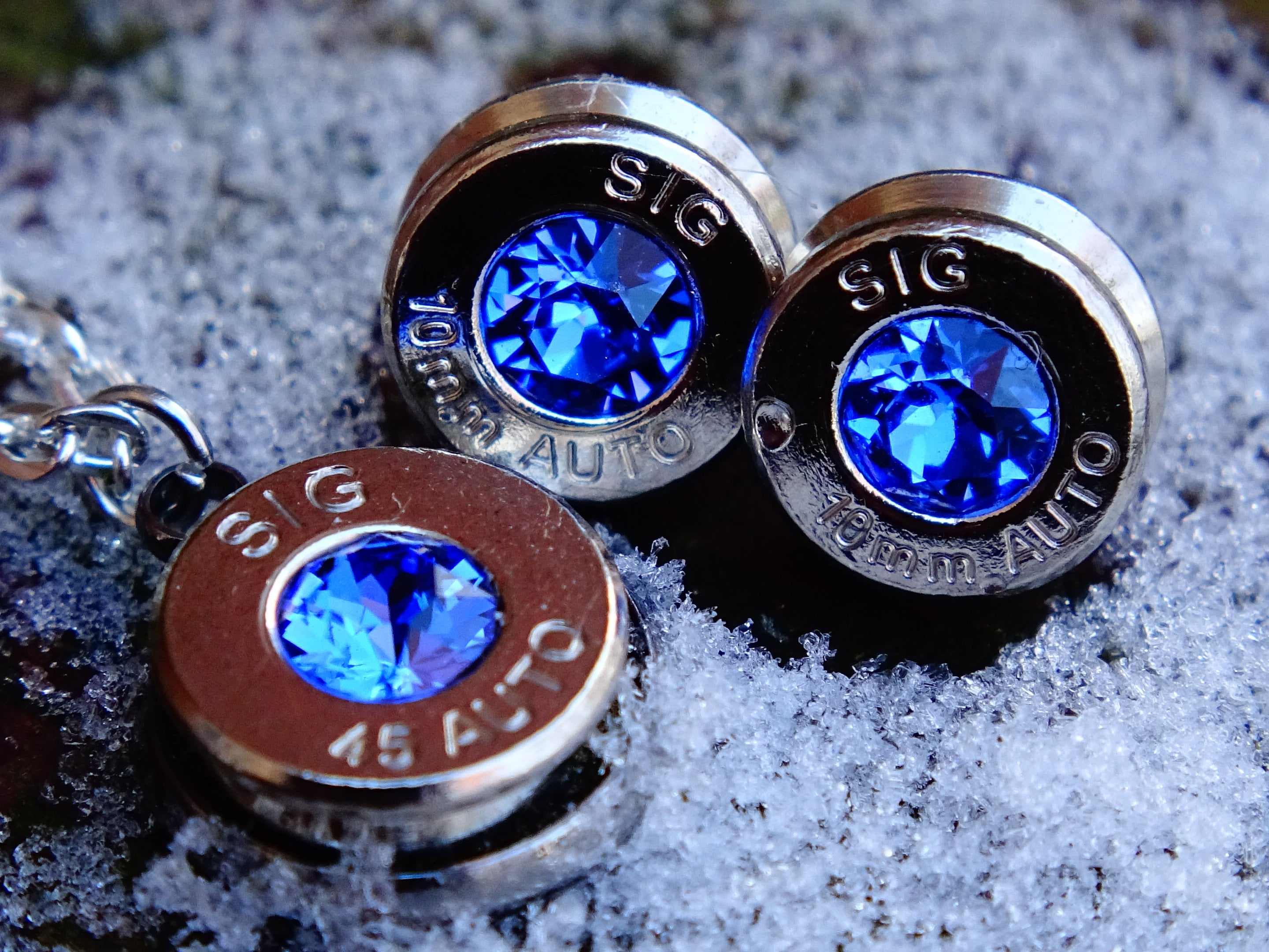 10mm bullet earrings & 45 ACP pendant set swarovski blue sapphire (etsy image id: 2125542334)