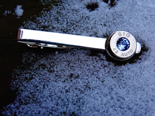 45 ACP silver tone bullet tie clip swarovski ice blue sapphire (etsy image id: 2125550700)