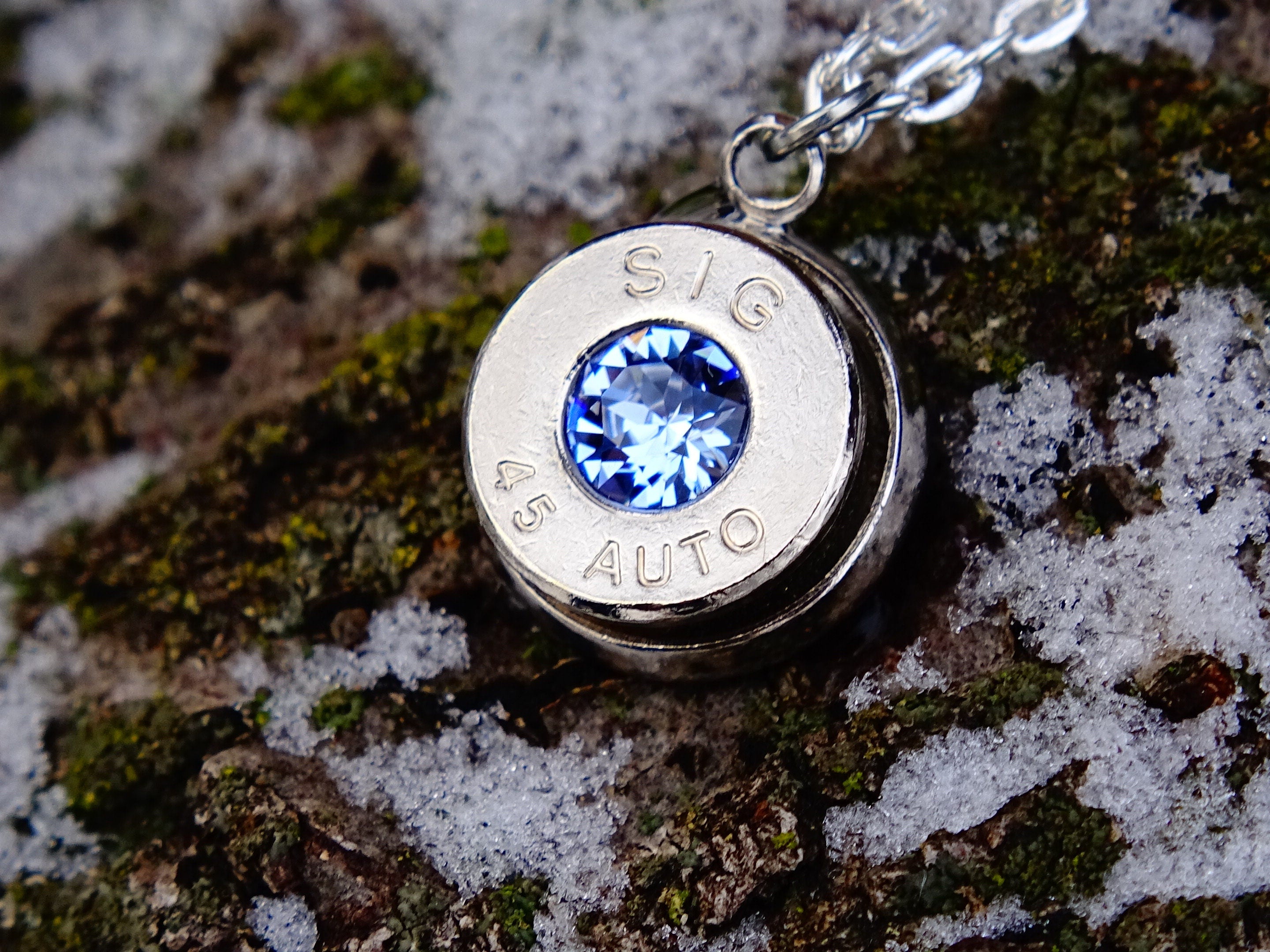 10mm bullet earrings & 45 ACP pendant set swarovski ice blue light sapphire (etsy image id: 2173097003)