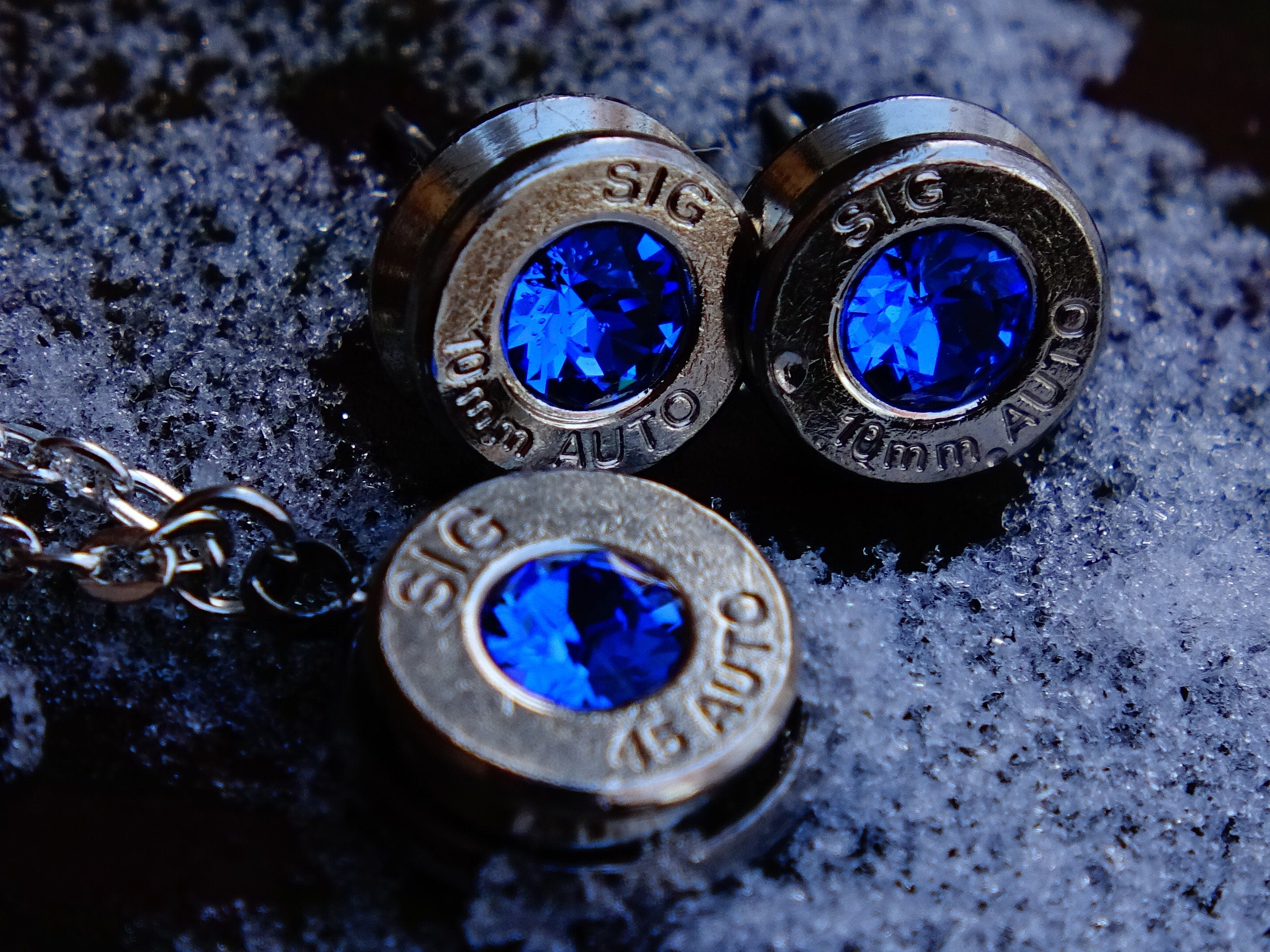 10mm bullet earrings & 45 ACP pendant set swarovski blue sapphire (etsy image id: 2173099569)
