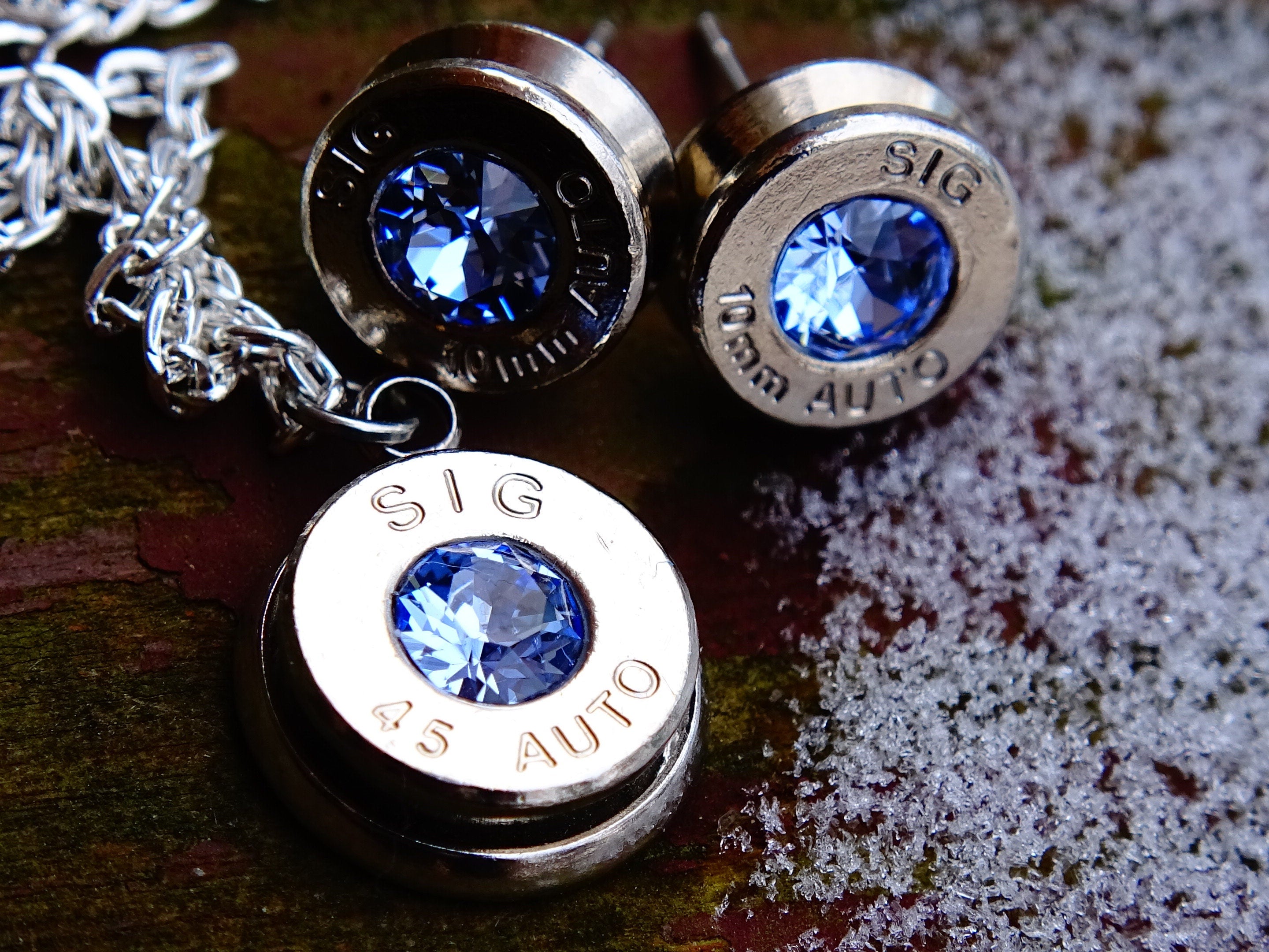10mm bullet earrings & 45 ACP pendant set swarovski ice blue light sapphire (etsy image id: 2173128749)