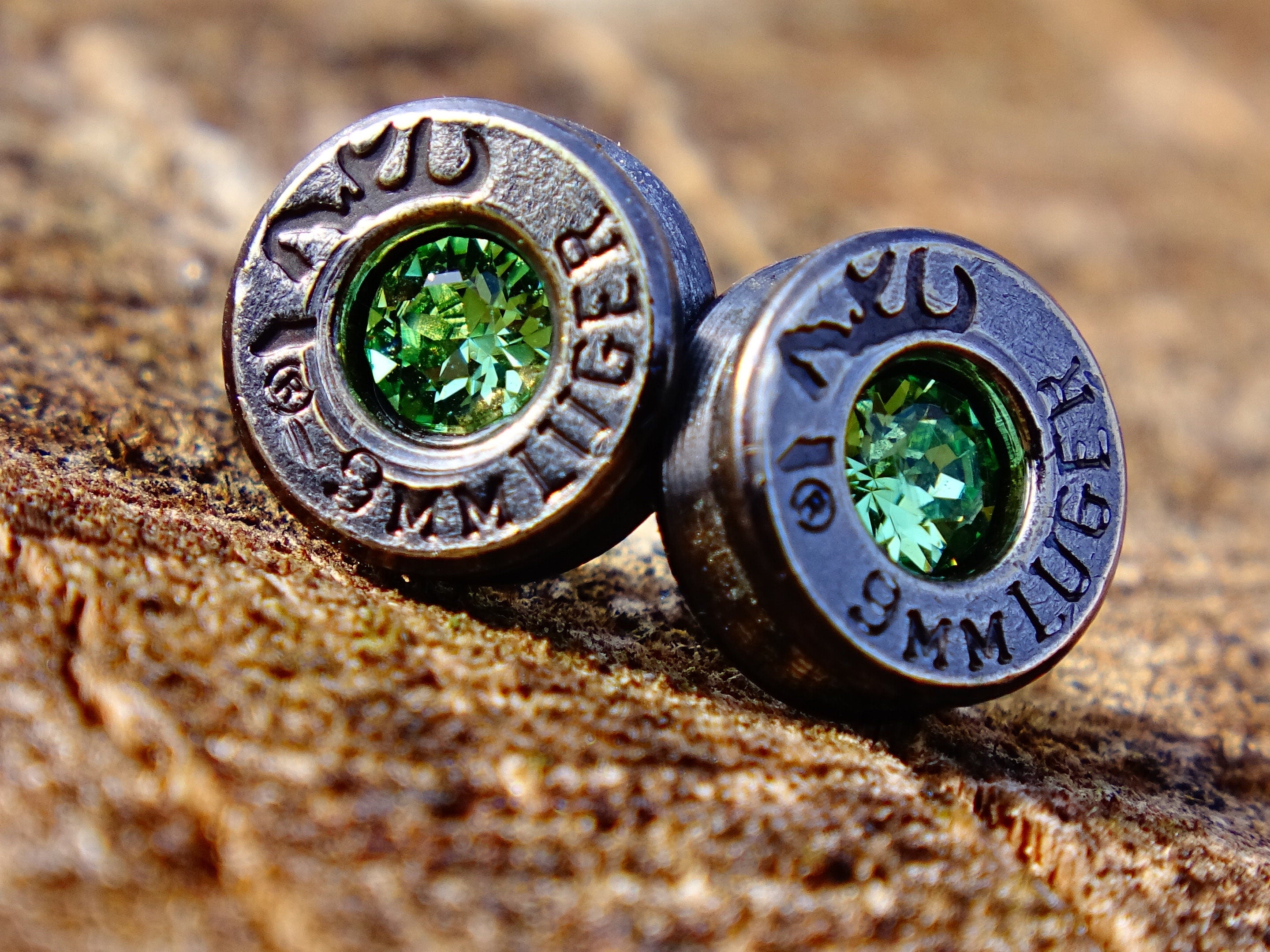 Bullet earrings gunmetal peridot (etsy image id: 2306392757)
