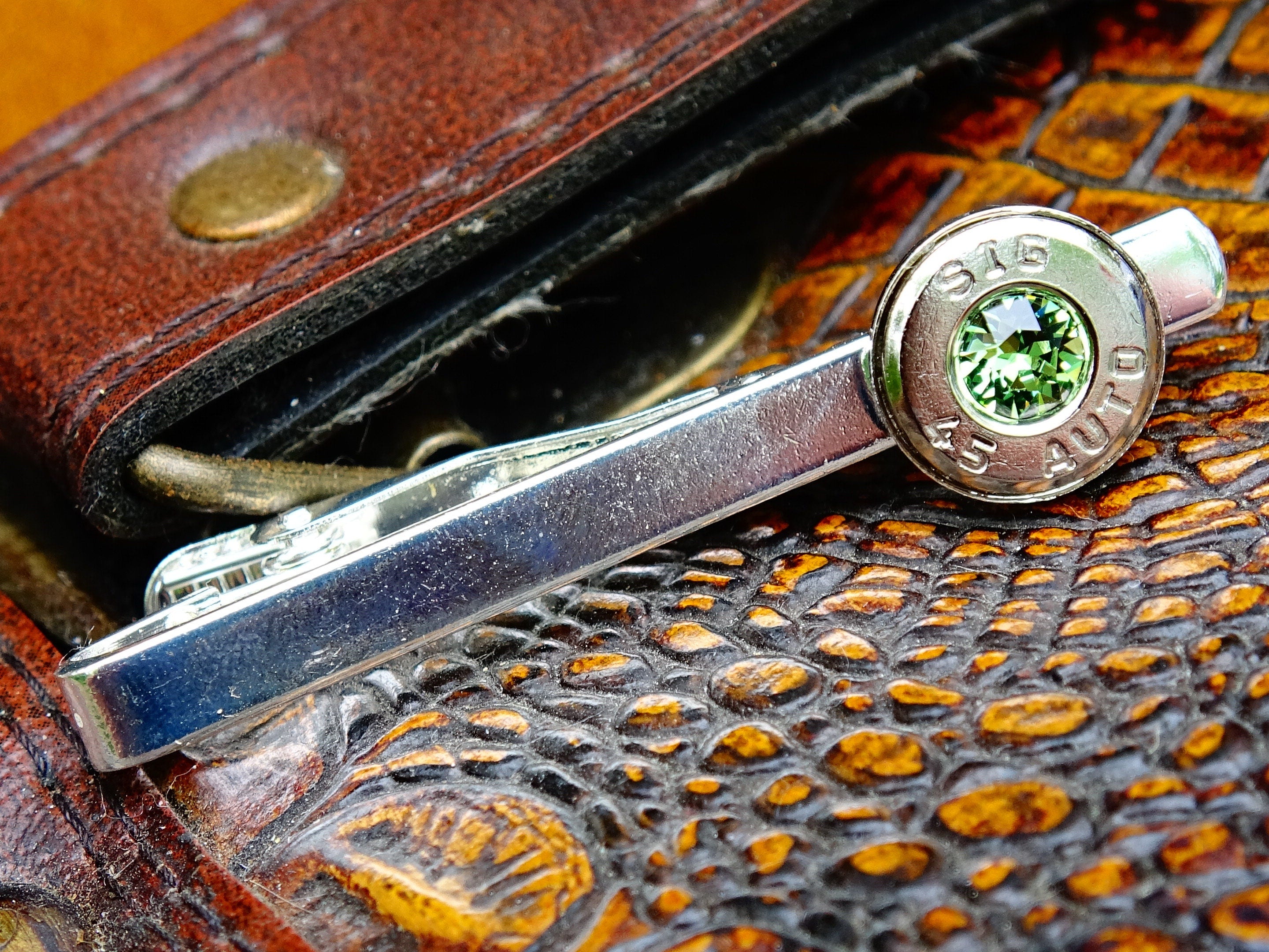 Bullet tie clip .45 ACP peridot (etsy image id: 2329807910)
