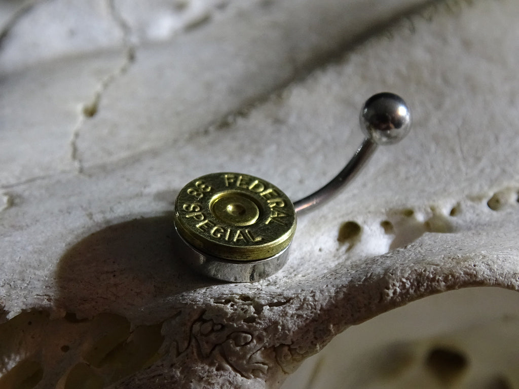 Fallout raider belly ring "real .38 special bullet case" (etsy image id: 3385779048)