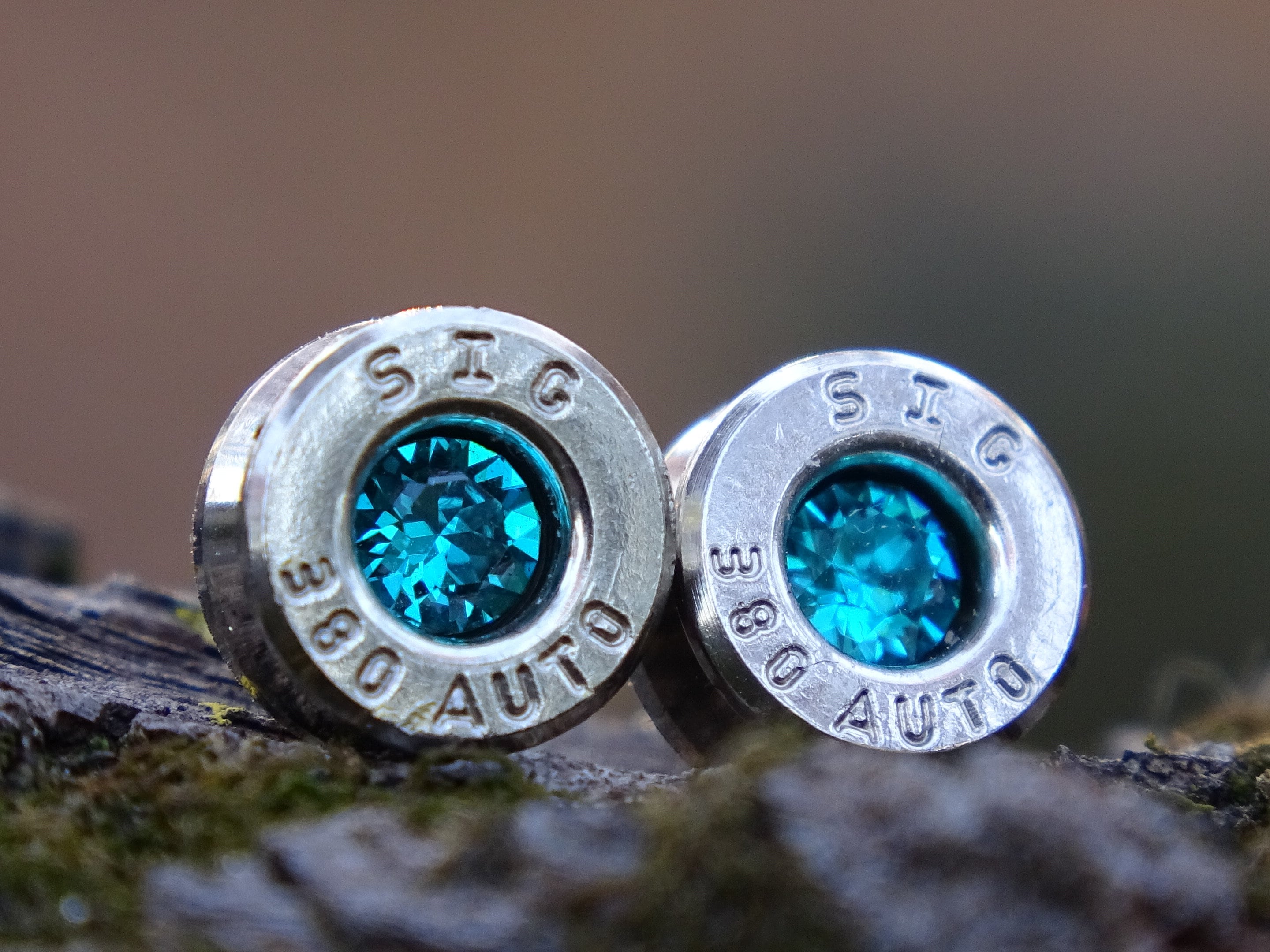 Bullet earring 380 auto Blue Zircon (etsy image id: 4354762663)