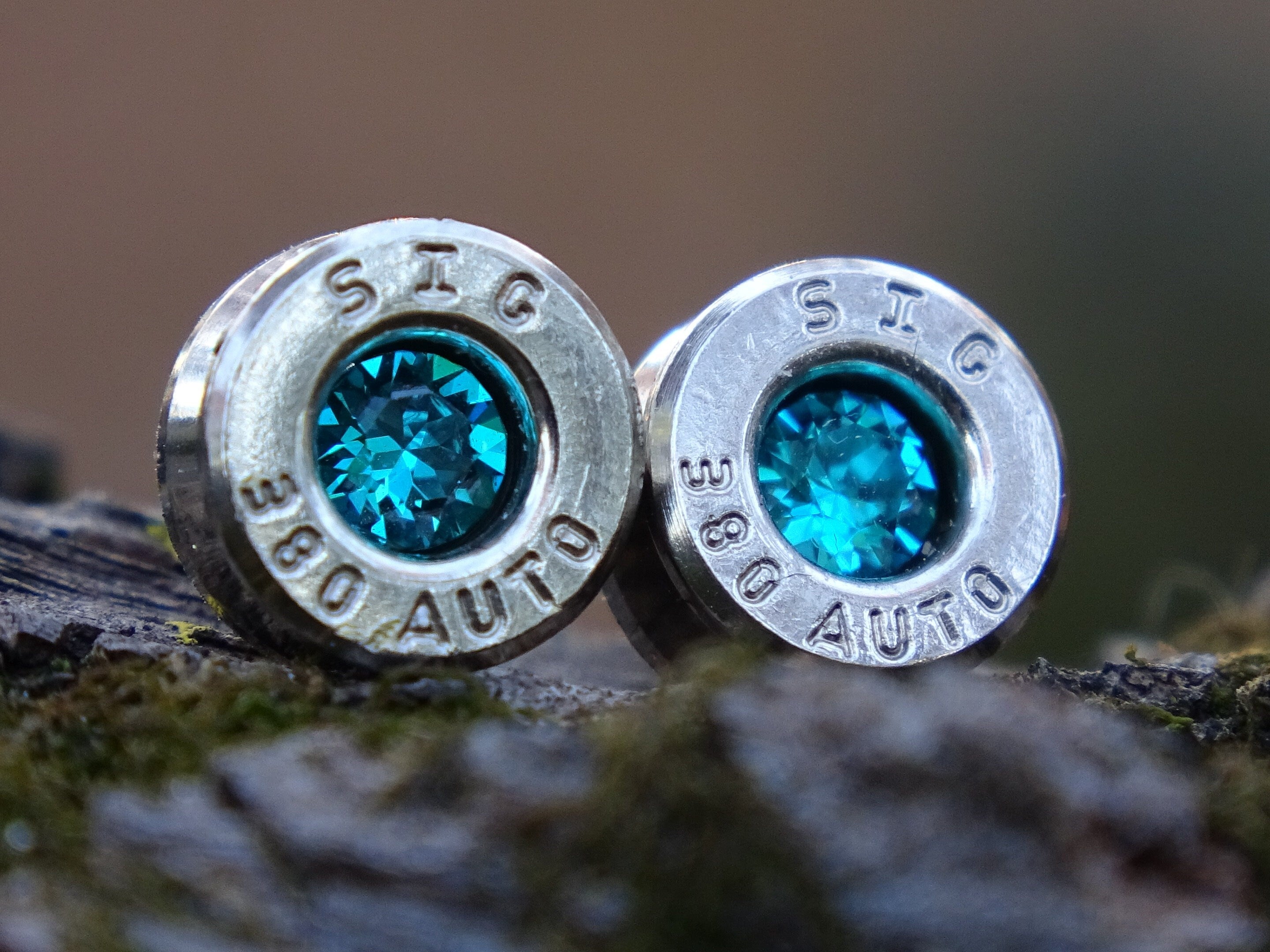 Bullet earring 380 auto Blue Zircon (etsy image id: 4354762879)