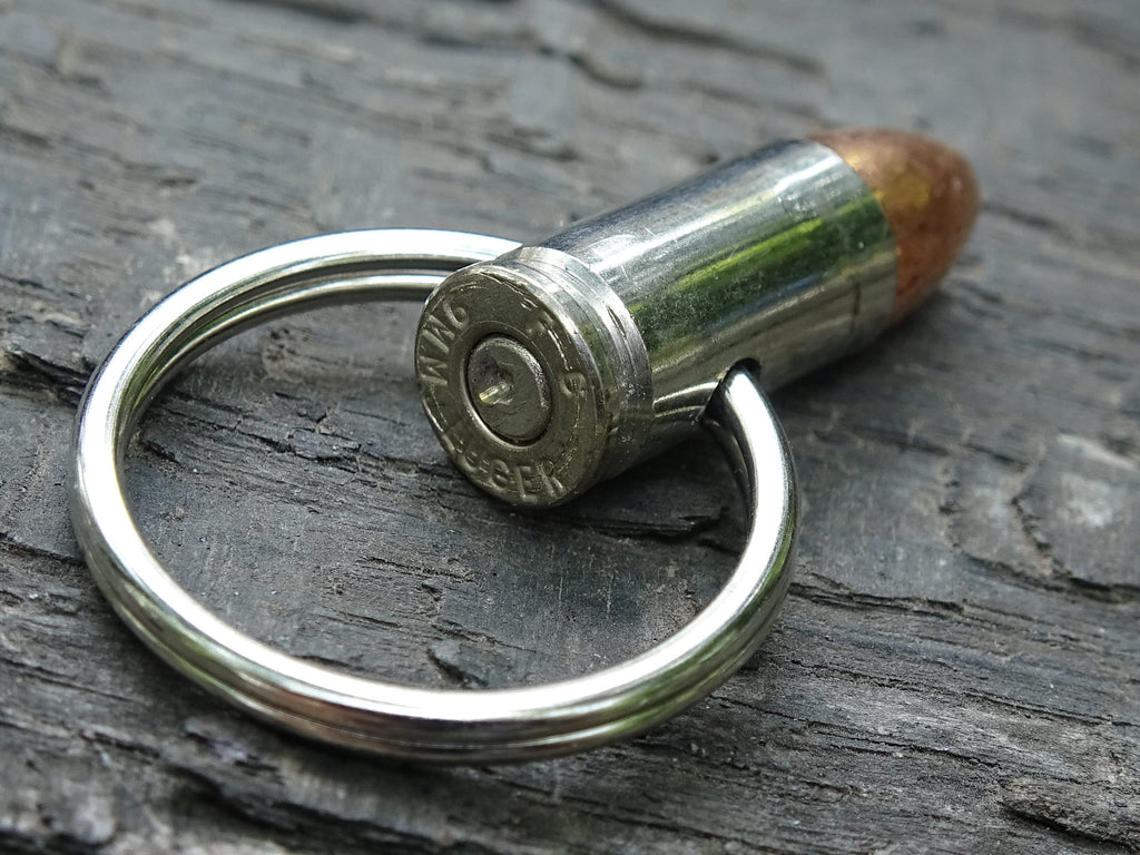 Bullet Keychain 9mm set of two Nickel plated (etsy image id: 5063578403)
