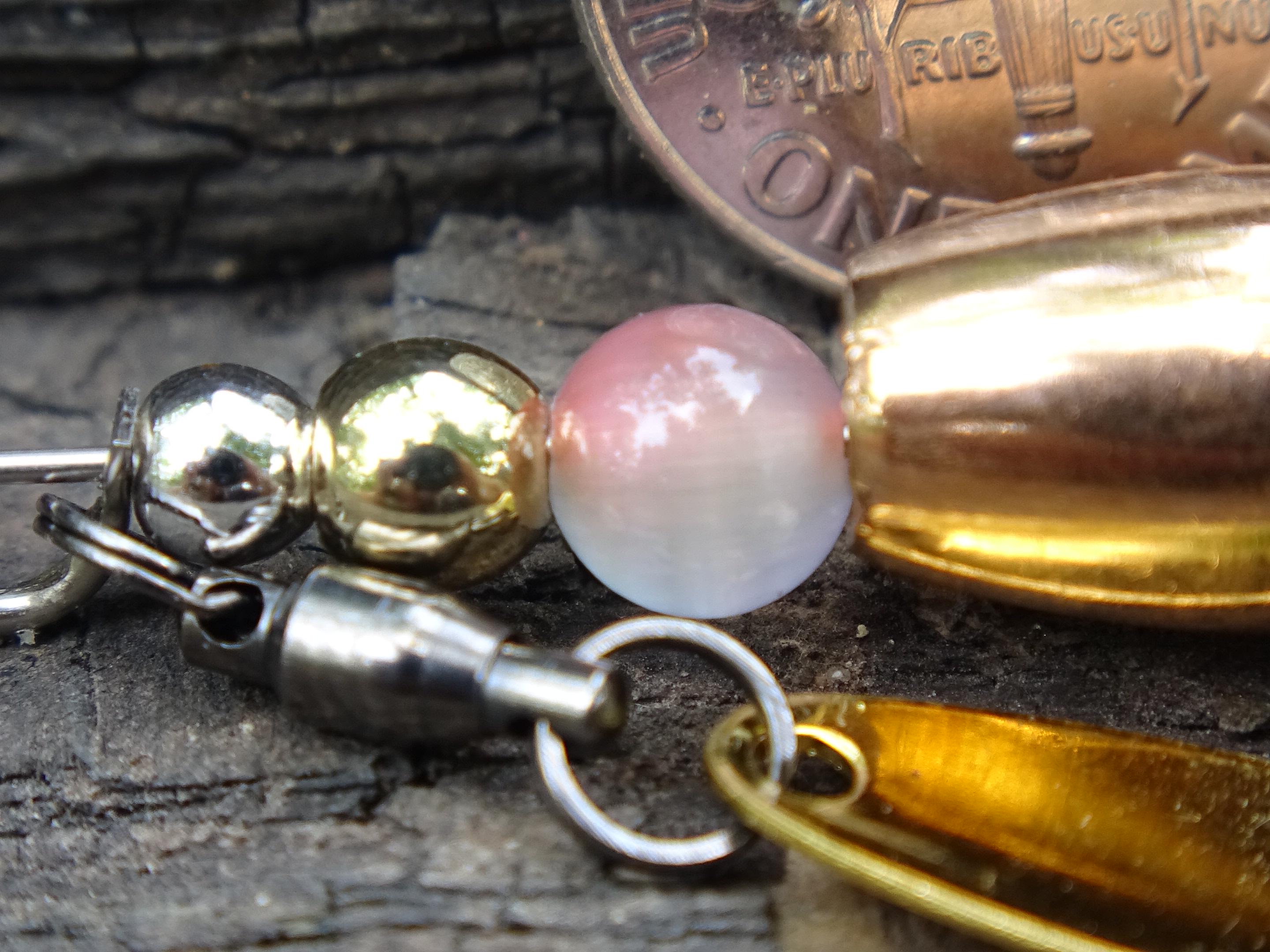 James Henry 9mm bullet fishing lure coral moonstone bead 14k filled bead .925 filled bead (etsy image id: 7019746446)