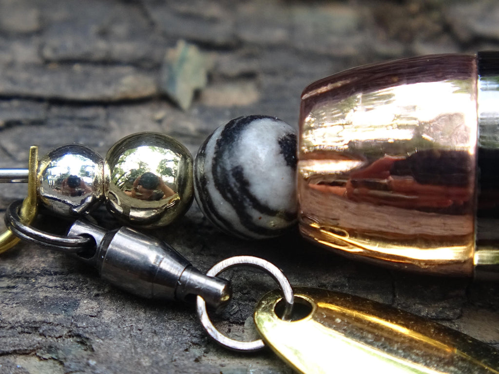 James Henry 45 ACP bullet fishing lure zebra agate bead 14k filled bead .925 filled bead (etsy image id: 7019932876)