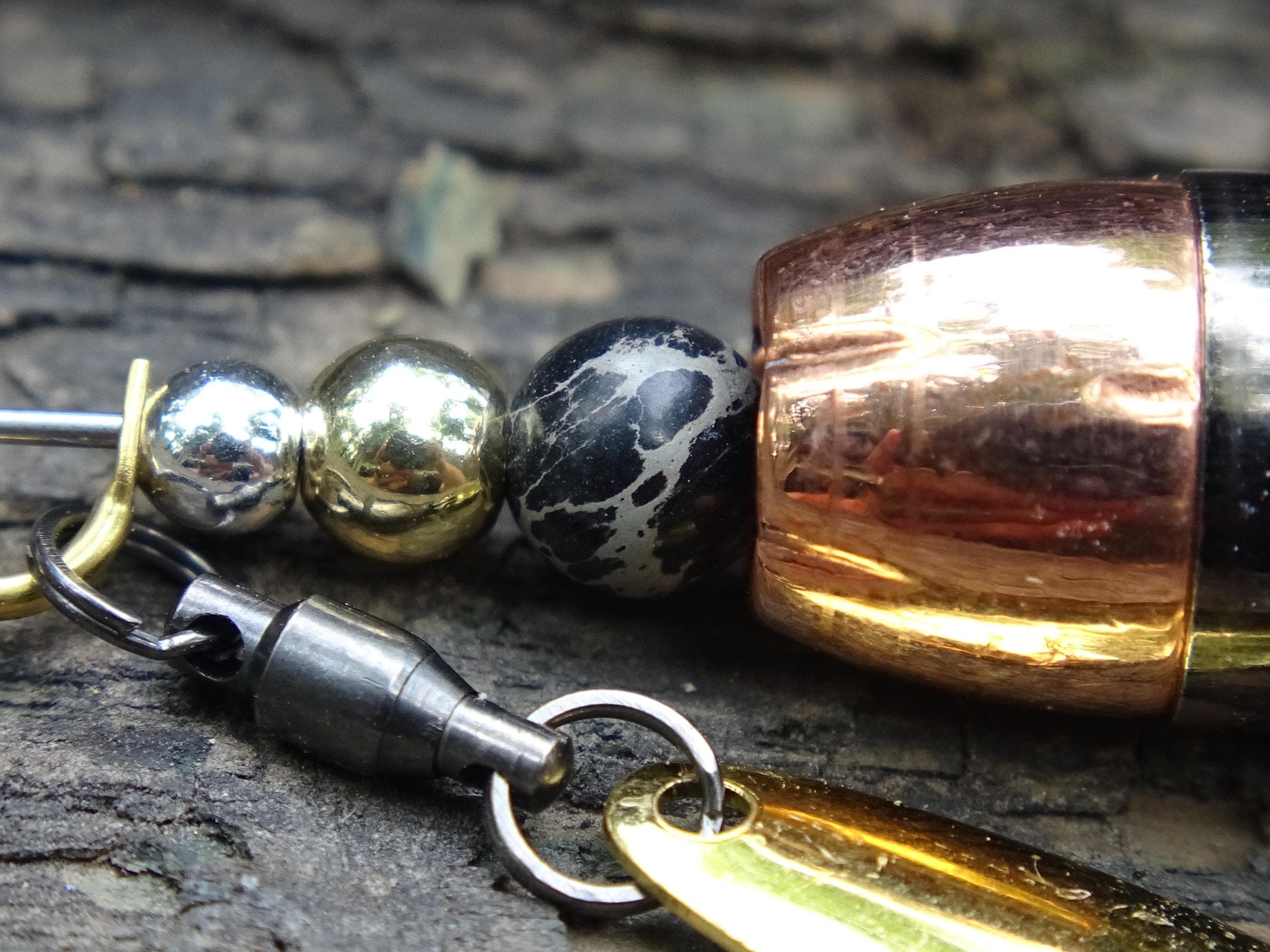 James Henry 45 ACP bullet fishing lure black agate bead 14k filled bead .925 filled bead (etsy image id: 7019947698)