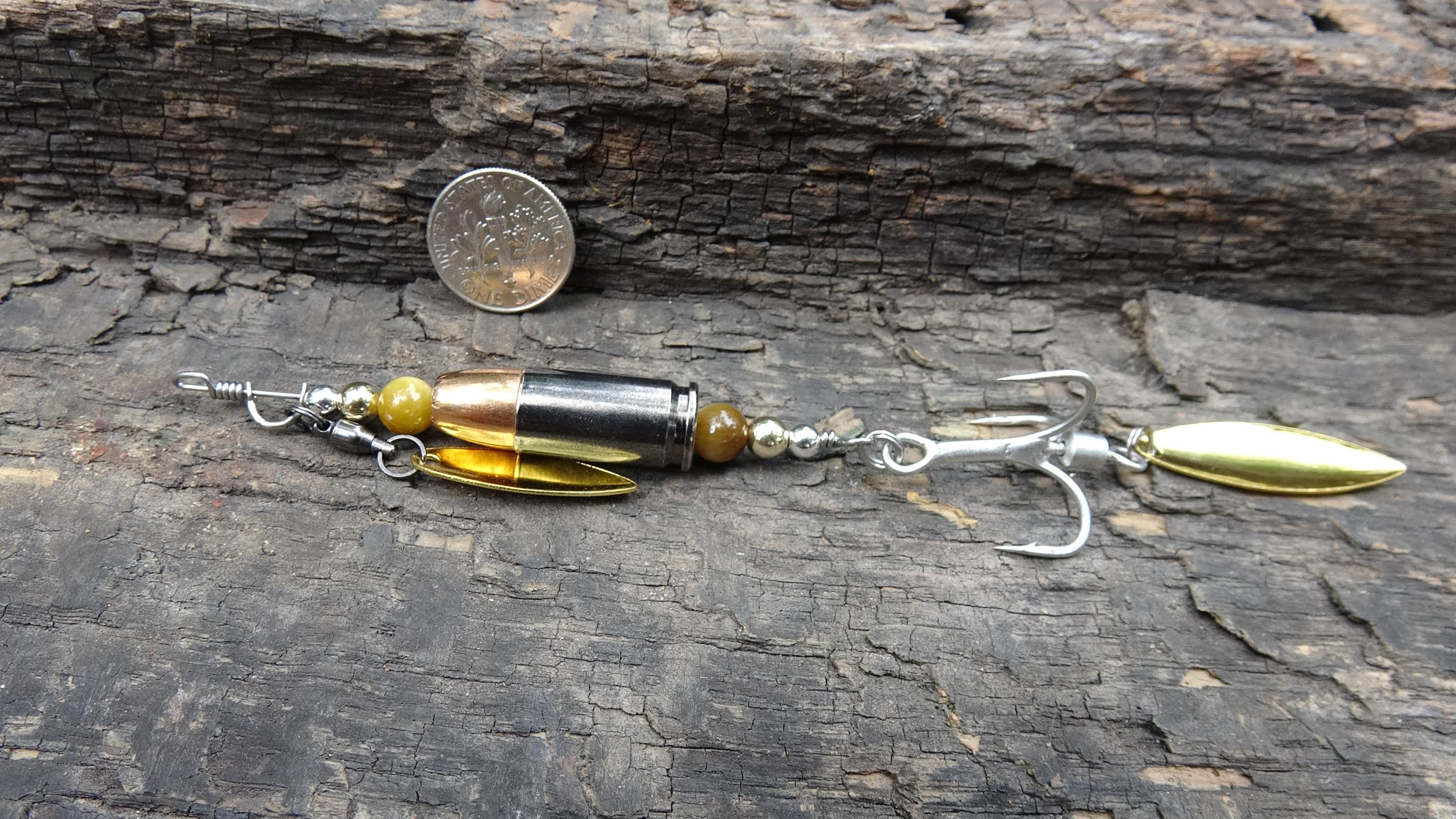 James Henry 9mm bullet fishing lure yellow tigers eye bead 14k filled bead .925 filled bead (etsy image id: 7067297227)