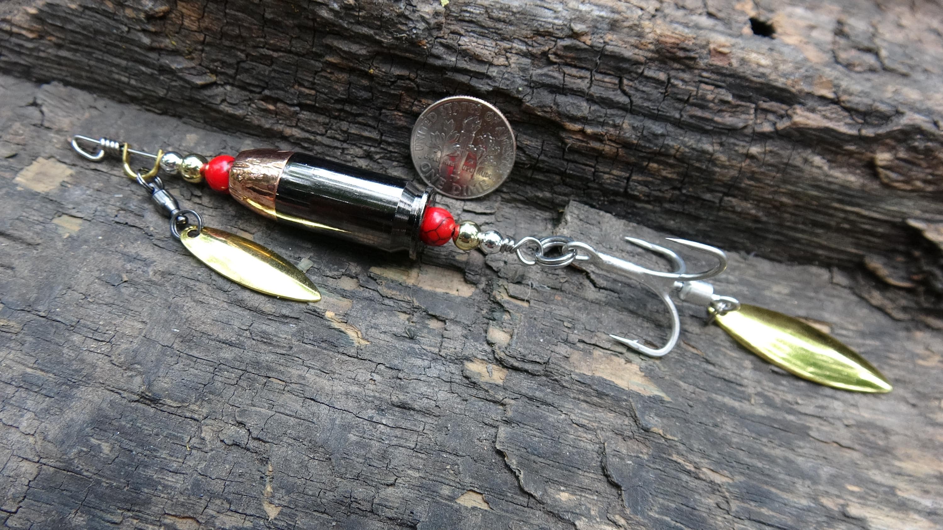 James Henry 45 ACP bullet fishing lure red black agate bead 14k filled bead .925 filled bead (etsy image id: 7067899319)