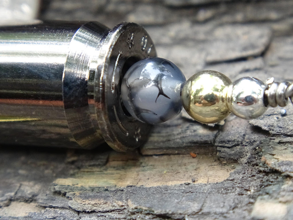 James Henry 45 ACP bullet fishing lure white dragon agate bead 14k filled bead .925 filled bead (etsy image id: 7067931043)